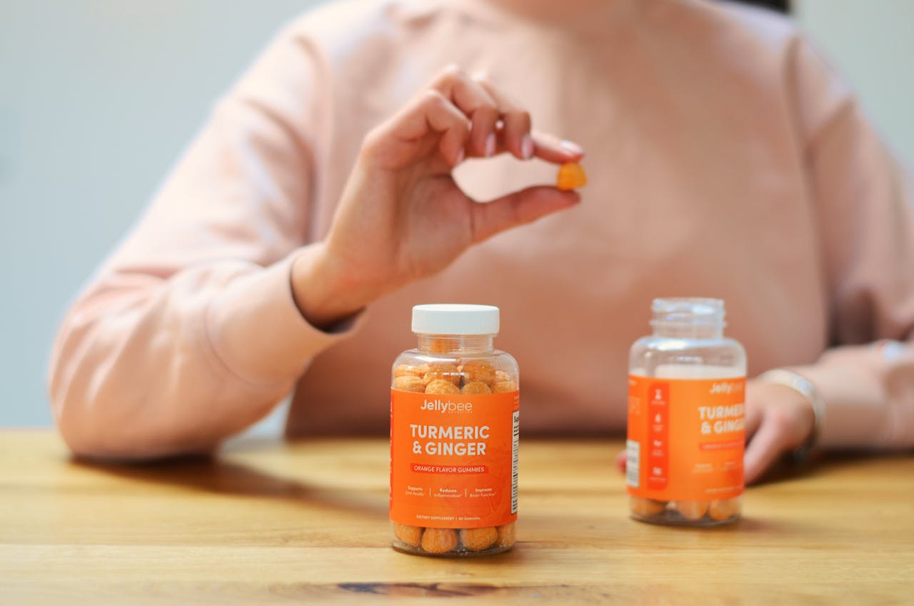 why-choose-us-02 Close-up of turmeric and ginger gummies being held. Perfect for health and wellness content.